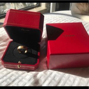 Cartier Love Ring. 18K yellow gold. Width: 5.5mm.